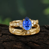 Nature-Inspired Vintage 4-Prong Pear Cut Sapphire Bridal Set
